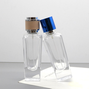 Manufacturer's 50ml Transparent Square Glass Perfume Dispensing Bottle Snap-On Empty Cosmetic Bottle with Crystal White Finish - Product Image 1