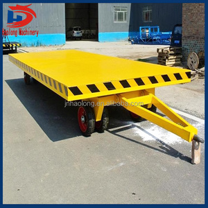 Xe kéo phẳng được sử dụng để vận chuyển hàng hóa trong khu vực nhà máy bằng cách sử dụng xe tải phẳng chuyển - Product Image 2