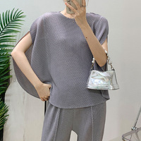 T-shirt décontracté plissé irrégulier en forme de pomme pour femme, nouvelle collection été 2025, écologique, respirant, séchage rapide, anti-plis, coupe ajustée