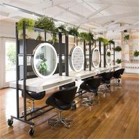 Station de maquillage moderne à miroir LED rond pour 2 personnes pour salon de beauté Table en bois et métal avec verre pour salon de coiffure
