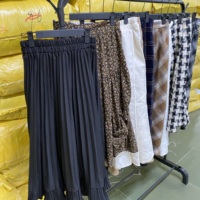 Vente en gros de jupes d'hiver imprimées d'occasion, lots de jupes de seconde main au design tendance, approvisionnement en vrac