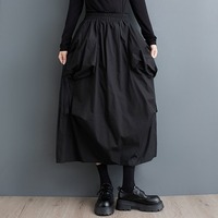 Nouvelle jupe longue fluide décontractée vert olive pour femme, taille élastique, poches plaquées, bretelles, collection automne 2026, vente en gros