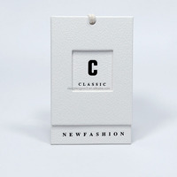 Vêtement de luxe Étiquette volante personnalisée Logo en relief Vêtements en papier blanc mat