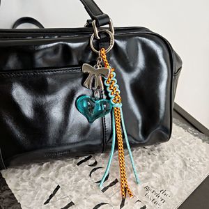 Porte-clés haut de gamme en métal Maillard avec pendentif cœur et corde tressée assortie, avec pendentif de sac et porte-clés de couleur contrastante - Product Image 2