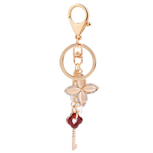 Porte-clés créatif vintage en métal avec strass en cristal, motif trèfle à quatre feuilles, fleur d'opale en forme 3D, mousqueton léger - Product Image 6