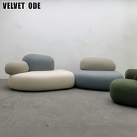 Nouveauté Canapé en tissu de luxe haut de gamme en forme de galet Cadre en bois massif Structure robuste Meubles durables pour villa et appartement