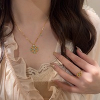 Nouvel ensemble de bijoux délicats chinois 2026 : Collier anneau émaillé ajouré de luxe léger et rétro, qualité supérieure