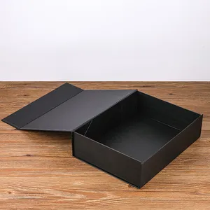 Scatola regalo magnetica nera di lusso con logo personalizzato confezione con trattamento abbronzante pieghevole a forma di libro magnetico scatola di imballaggio cosmetico