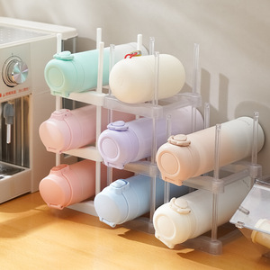 Estante de almacenamiento para vasos aislados, soporte para botellas de agua blanco transparente apilable de 3 capas para organización de gabinetes de cocina en el hogar - Product Image 1