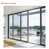 Balcon extérieur moderne empilable en alliage d'aluminium avec porte coulissante en verre double vitrage trempé, étanche et isolant thermiquement