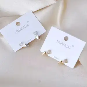 HuanCai, superventas, especial en forma de corazón, moda diaria, hebilla de oreja de circón chapada en cobre, accesorios de fiesta románticos de alta calidad