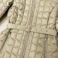 Classique léger matelassé femmes manteau mince Nylon tissus plié duvet de canard manteau avec ceinture en cuir matelassé doudounes dames