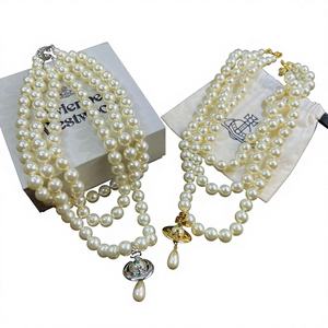 Collar con Colgante de Aleación de Perlas de Tres Capas con Diseño de Gotas de Agua, Saturno y OVNI, Chapado en Oro, Estilo Vivian West Dowager, Multicapa, para Madrina - Product Image 1