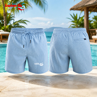 Shorts de plage personnalisés avec logo, shorts de bain décontractés pour hommes, cordon de serrage à la taille, extensibles dans 4 directions, shorts de surf ODM