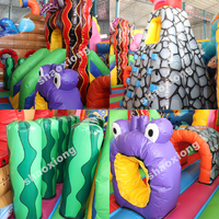 Parc d'attractions gonflable commercial avec toboggans, zones de saut et d'escalade, thème océan, pour enfants, aire de jeux gonflable