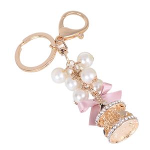 Dainty Pearl Girls Carousel Keychain Rhinestone Merry Go Bag Hanging Accessory Crystal Material Silk Screen Printing for Gifts - Product Image 1