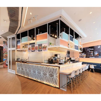 Comptoir de bar en pierre artificielle à surface solide, antibactérien, écologique, contemporain, décoré d'éclairage LED brillant, pour les écoles