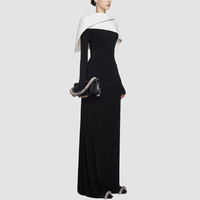 Robe longueur au sol tricotée bloquée de couleur noire et blanche 2024 nouvelle robe longue plissée épaule asymétrique