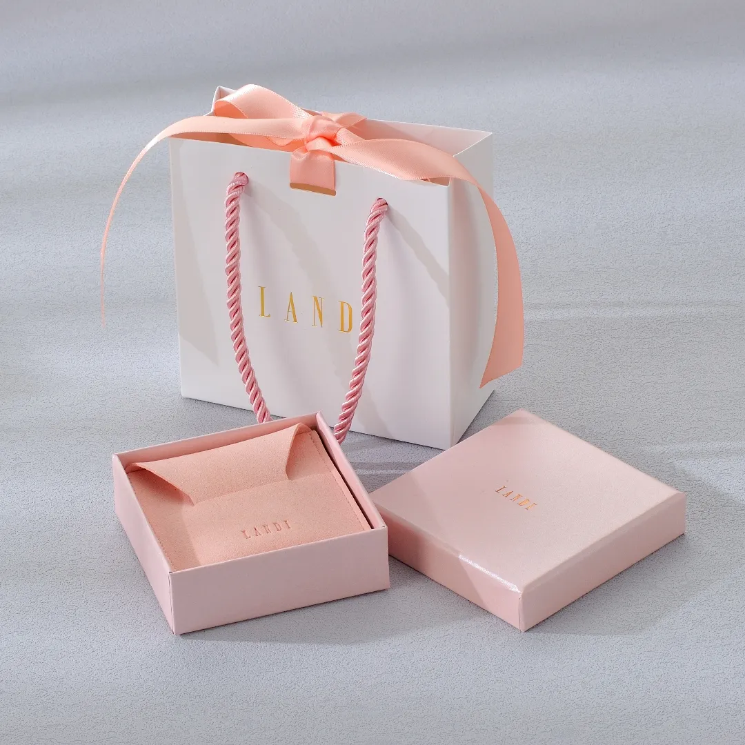 Boîte à bijoux imprimée personnalisée Boîtes d'emballage en papier personnalisé avec tiroir Boîtes à bijoux en carton avec sac pochette
