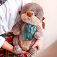 Peluche Otter Douce et Moelleuse avec Écharpe Tricotée, Adorable Animal Assis en Peluche pour Décoration d'Intérieur et Cadeau