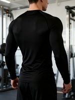 T-shirt sportif à manches longues et col rond pour homme, coupe ajustée, tissu en soie de lait hautement élastique, évacuation de l'humidité, séchage rapide, entraînement physique