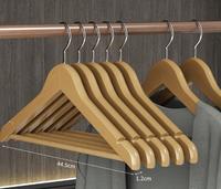 Cintres en bois massif magasin en bois hôtel vêtements suspendus orthèse gros vêtements en bois vêtements suspendus orthèse