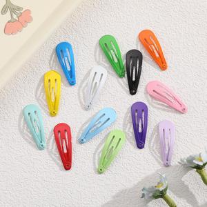 กิ๊บติดผมแบบผสมสีสันสดใส กิ๊บหนีบผมรูปโบว์ขนาด 3 ซม. มินิหลากสี ดีไซน์การ์ตูนโลหะ สำหรับเด็กผู้หญิง บรรจุภัณฑ์แบบขายส่ง - Product Image 2