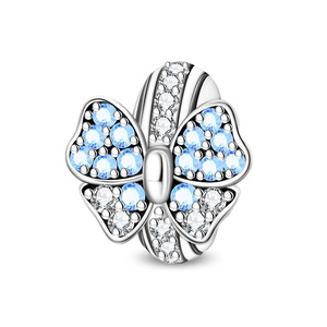 Esta colección de pulseras y colgantes de latón blanco adorables presenta diseños de mariposas, flores, zorros y rompecabezas. - Product Image 2
