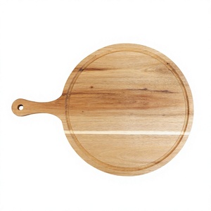 Planche à découper ronde en bois d'acacia avec poignée et rainure pour les jus, fabriquée au Vietnam - Product Image 1