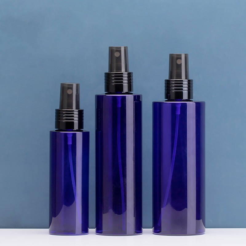 Blue bottle with black sprayer