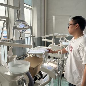 Foshan fabbrica di sedia dentale <span class=keywords><strong>unit</strong></span>à 16 set di un contenitore con luce di cura libera e mobile Scaler superiore montato <span class=keywords><strong>unit</strong></span>à dentale - Product Image 6