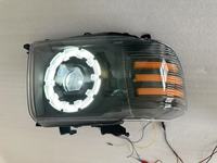 Ensemble de phares LED personnalisés Land Cruiser LC7 avec anneaux lumineux Angel Eyes, modèles 2007-2023, avec guides de lumière jaunes ou blancs.