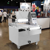 Chaîne de production de biscuits et macarons : Machine à extrusion et découpe de petits biscuits, ligne de production de macarons et biscuits.