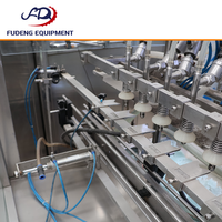En stock, stock limité : Machine de remplissage linéaire automatique ZHGA, remplisseur submersible à 12 têtes, faible nombre d'heures de fonctionnement, en acier inoxydable 316.