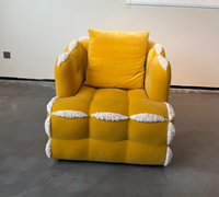Canapé individuel en forme de nuage jaune vif, garniture moelleuse qui vous enveloppe doucement pour profiter d'un temps de loisirs confortable à la maison