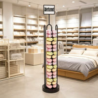 Présentoir métallique sur pied personnalisé et moderne pour accessoires de voyage en mousse à mémoire de forme (oreiller de nuque en U pour voiture)