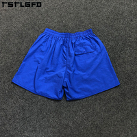Shorts d'été pour hommes en coton et nylon, taille élastique, couleur unie, décontractés, sportifs, mi-longs, imperméables, respirants, séchage rapide, écologiques, anti-UV