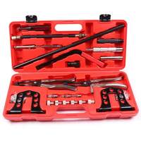 Kit d'outils professionnel pour la réparation de culasses de moteurs à 8, 16 et 24 soupapes, comprenant un compresseur de ressort de soupape et un outil de démontage/installation.
