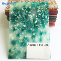 Feuilles fantaisie en acrylique-celluloid de couleur bleue avec paillettes, comme matériau de décoration