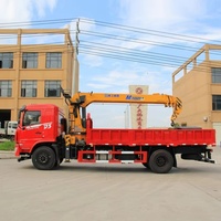 Camion-grue de construction pour le levage de matériaux de construction, la décoration de villas et les projets résidentiels haut de gamme