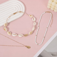 Nouvelle Collection 2026 : Ensemble Collier Ras-du-Cou Perlé Trois Pièces pour Femme, Style Bohème Tendance, avec Coquillages en Alliage Thème Océan, Idéal pour Fêtes et Quotidien