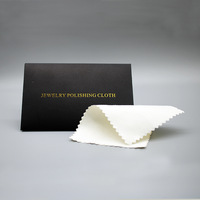 Chiffon de polissage argenté de qualité supérieure avec enveloppe noire à feuille d'or pour le branding de bijoux haut de gamme et le kit de soin pour boutique
