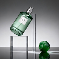 Flacon de parfum cylindrique vert clair très demandé, avec bouchon en verre tourbillonnant en option ou pompe pulvérisatrice argentée, logo et boîte personnalisables