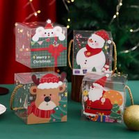 Meilleur prix, boîte d'emballage de Noël portable et réutilisable en PET transparent avec des poignées en jute jaune, design de dessin animé mignon, vente en gros