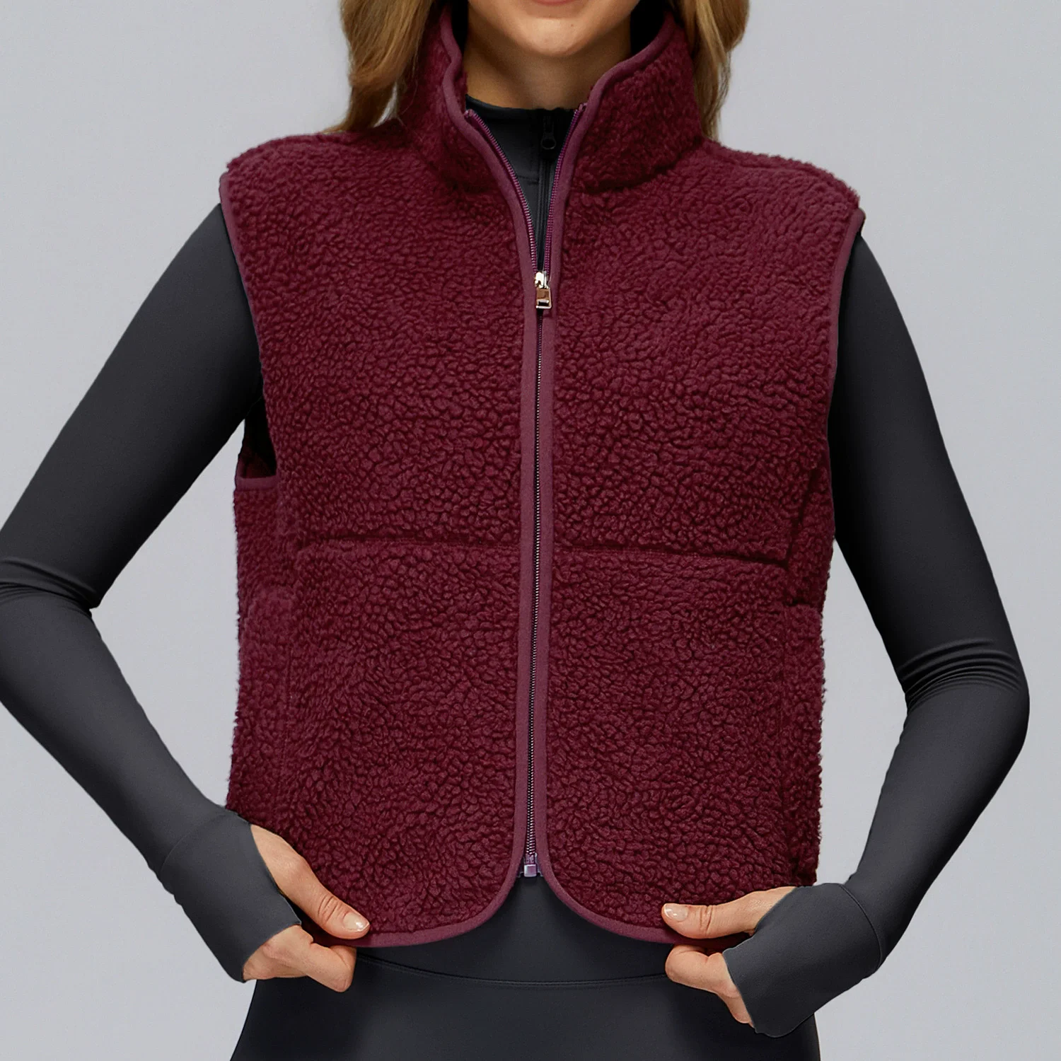 Zip-Up Sleeveless Activewear Vest (9500): closure, strap or waistband adjustment reference