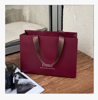 Sacs en papier de luxe noirs imprimés en gros, sacs en papier horizontaux pour cosmétiques, vêtements, emballages capillaires, sacs de shopping rose vif