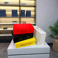 Boîtes d'emballage de cadeau de luxe imprimées à la main personnalisées en forme de livre Boîte d'emballage de sac à main avec logo personnalisé