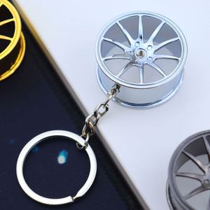 Metal <b>Key</b> <b>Chain</b> Car Hub Mini Tire Wheel <b>Key</b> <b>Chain</b> - Product Image 1
