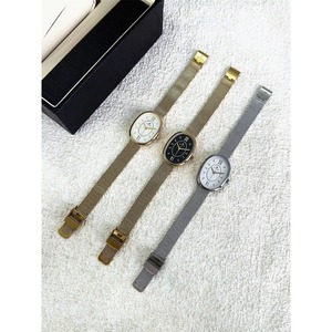 Montre à quartz imperméable pour femmes, cadran ovale blanc, bracelet en maille dorée, élégante et minimaliste, montre-bracelet pour femmes - Product Image 6