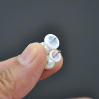 Haute qualité en gros 7mm UFO-forme Silicone bouchon d'oreille bouchon clair zircone anneau en céramique avec capuchons de perles Hamburger boucle d'oreille dos